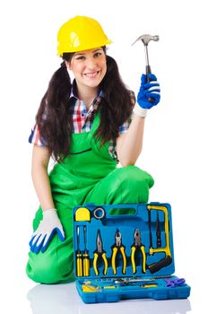 Woman with toolkit on white