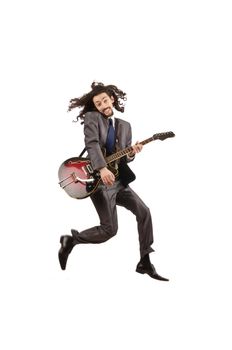 Guitar player in business suit on white