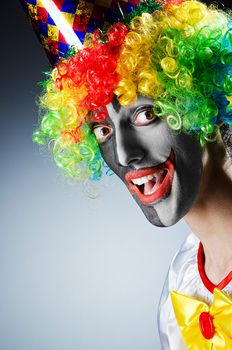 Funny clown in studio shooting