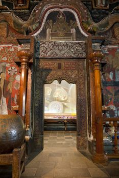 reclining buddha in a mosquito net, sri lanka