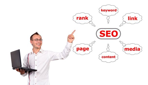 man with a laptop in hand points to seo