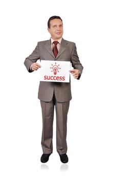 businessman holding a sign saying success