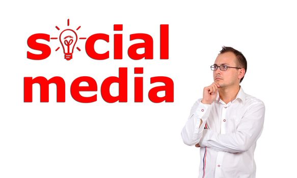 businessman looks at social media