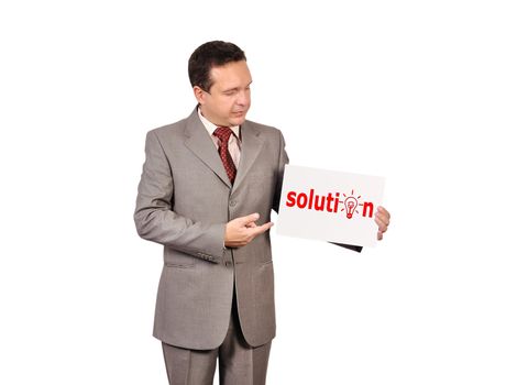 businessman holding a placard with solution
