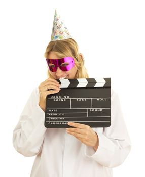 A female medical doctor with a clapperboard