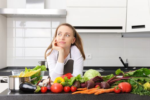 Woman cooking in modern kitchen