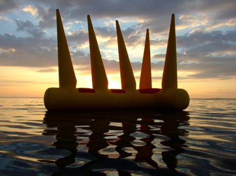 Greater bright inflatable toy on water on a sunset 2