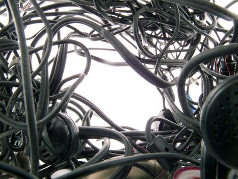 Interlacing of the broken off wires of old headphones. Background 2