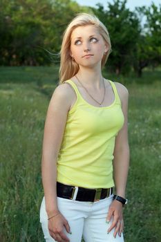 Portrait of a young beautiful blonde outdoors