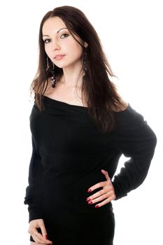 Portrait of pretty young brunette in black dress. Isolated