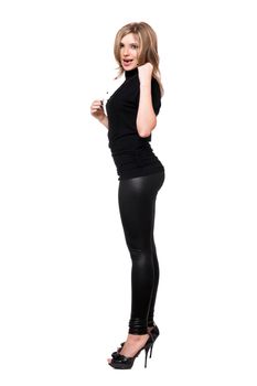 Sexy young woman in leggings. Isolated on white