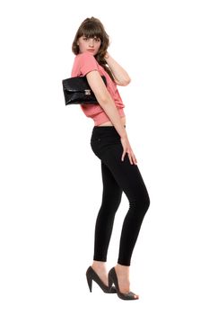 Young attractive woman in a black leggings. Isolated