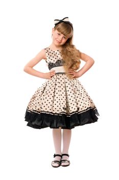 Beautiful little girl in a dress. Isolated