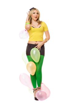 Beautiful young sexy blond woman with balloons