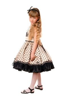 Attractive little girl in a dress. Isolated