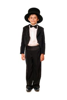 Handsome little boy in a tuxedo and hat. Isolated