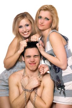 Two playful blonde and a guy in chains. Isolated