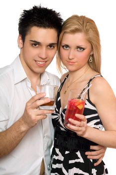 Smiling beautiful young couple with cocktails. Isolated