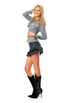 Cheerful pretty blonde in a gray skirt
