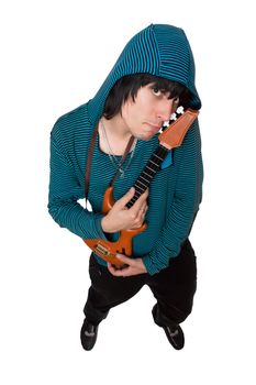 Bizarre young man with a little guitar. Isolated