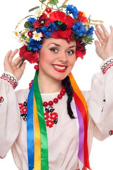 Portrait of happy young woman in the Ukrainian national clothes