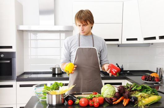 Man cooking in modern kitchen