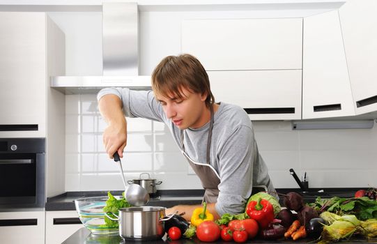 Man cooking in modern kitchen