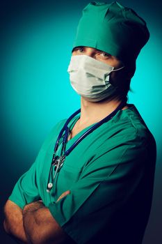 Surgeon with stethoscope over blue background