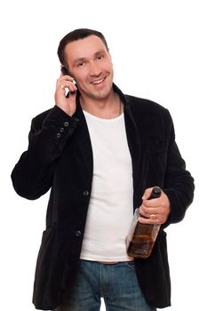 Smiling man with a phone and bottle of scotch. Isolated