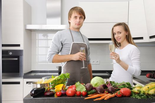 Couple cooking in modern kitchen