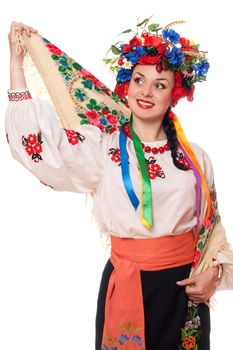 Portrait of pretty woman in the Ukrainian national clothes