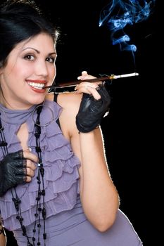 Portrait of a cheerful brunette with cigarette holder