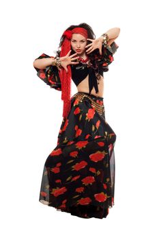 Expressive gypsy woman in a black skirt