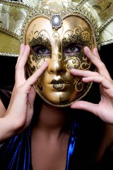 Portrait of girl in a Venetian mask