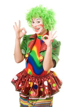Portrait of happy female clown. Isolated on white