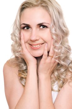 Portrait of smiling pretty young blonde. Isolated on white