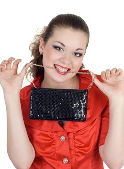 Young woman with a handbag in a teeth