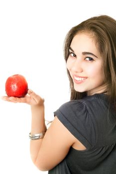 Joyful girl with an apple in her hand