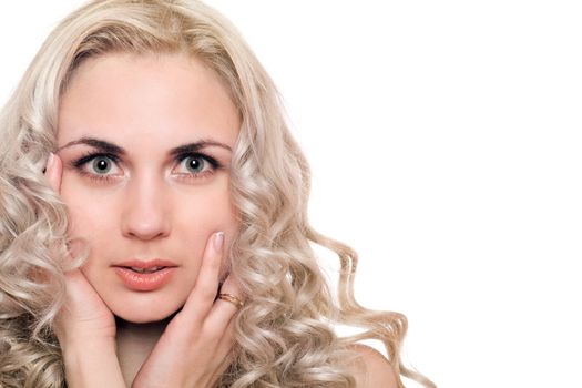Closeup portrait of beautiful young blonde. Isolated