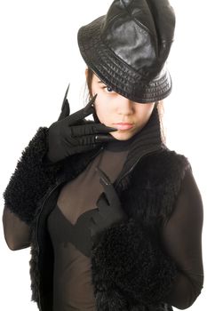 Portrait of attractive girl in gloves with claws. Isolated