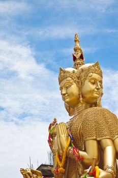 Golden Brahma statue in public temple of Thailand