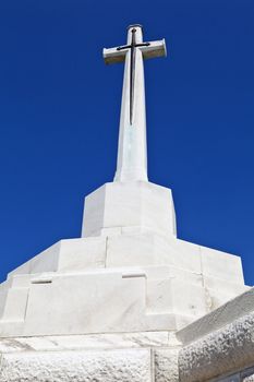 Cross of Sacrifice at Tyne Cot Cemetery in Ypres, Belgium.  Tyne Cot Commonwealth War Graves Cemetery and Memorial to the Missing is a Commonwealth War Graves Commission (CWGC) burial ground for the dead of the First World War in the Ypres Salient on the Western Front.
