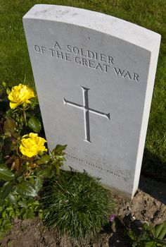 A gravestone of a soldier of the Great War in Tyne Cot Cemetery, Ypres.