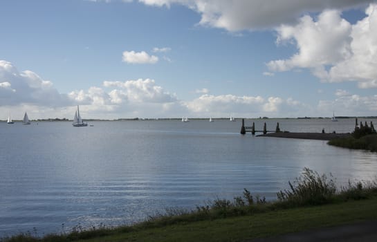 sailing boats on the lake called haringvliet  in Holland
