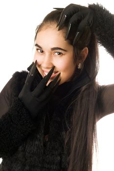 Portrait of joyful young woman in gloves with claws