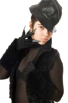 Portrait of beautiful girl in gloves with claws. Isolated