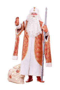 Russian Christmas character Ded Moroz (Father Frost) with the stick in his hands. Isolated on white