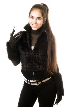 Portrait of smiling young brunette in gloves with claws