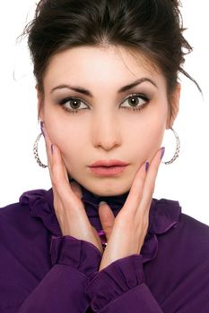 Closeup portrait of pretty young woman in a purple jacket
