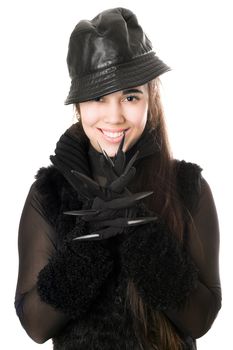 Portrait of smiling young brunette in gloves with claws. Isolated